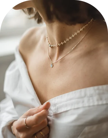 Woman wearing elegant silver necklace